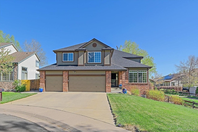 10127 W 100th Ct, Westminster, CO 80021 - view of front of property with brick siding, concrete driveway, an attached garage, and a shingled roof
