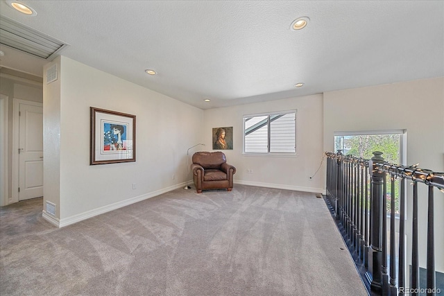 10127 W 100th Ct, Westminster, CO 80021 - unfurnished room with carpet floors, baseboards, recessed lighting, and a textured ceiling