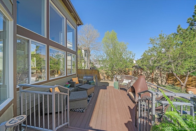 10127 W 100th Ct, Westminster, CO 80021 - deck featuring an outdoor living space and a fenced backyard