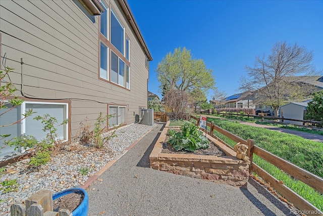 10127 W 100th Ct, Westminster, CO 80021 - view of side of property featuring central air condition unit