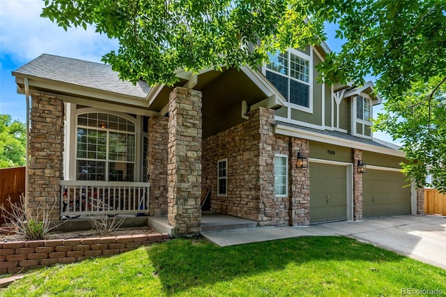 1588 W 111th Ave, Northglenn, CO 80234 - tudor-style house with a porch, an attached garage, concrete driveway, a shingled roof, and stone siding