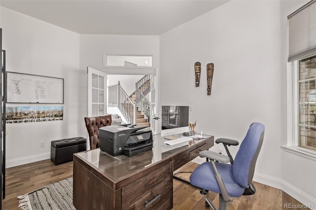 1588 W 111th Ave, Northglenn, CO 80234 - office space featuring wood finished floors and baseboards