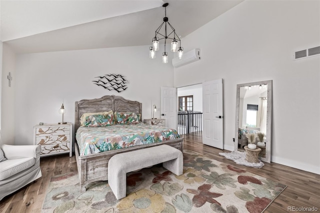 1588 W 111th Ave, Northglenn, CO 80234 - bedroom with high vaulted ceiling and wood finished floors