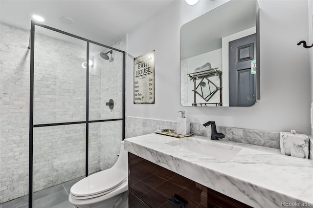 1588 W 111th Ave, Northglenn, CO 80234 - bathroom featuring a shower stall, vanity, and tile patterned flooring