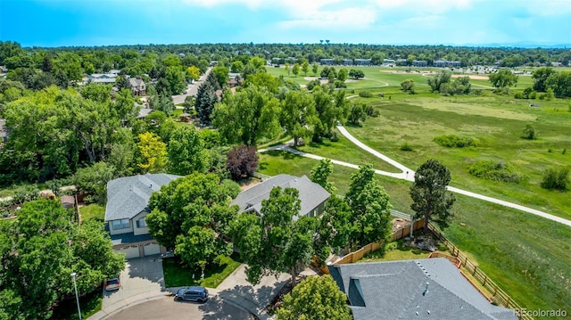 1588 W 111th Ave, Northglenn, CO 80234 - aerial view of residential area featuring a tree filled landscape