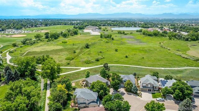 1588 W 111th Ave, Northglenn, CO 80234 - aerial perspective of suburban area with a mountainous background