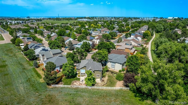1588 W 111th Ave, Northglenn, CO 80234 - aerial view of property and surrounding area featuring nearby suburban area