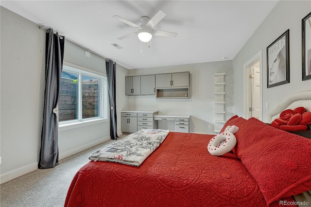 1915 Hunters Point Ln, Colorado Springs, CO 80919 - bedroom with light carpet and a ceiling fan