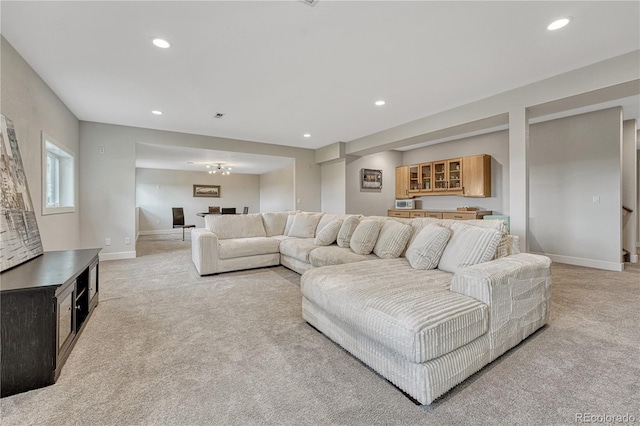 1915 Hunters Point Ln, Colorado Springs, CO 80919 - living area featuring light colored carpet and recessed lighting