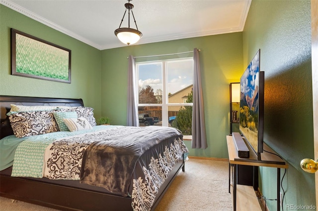 carpeted bedroom featuring ornamental molding