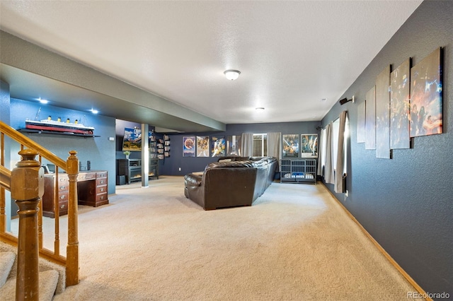 living room with carpet and a textured ceiling