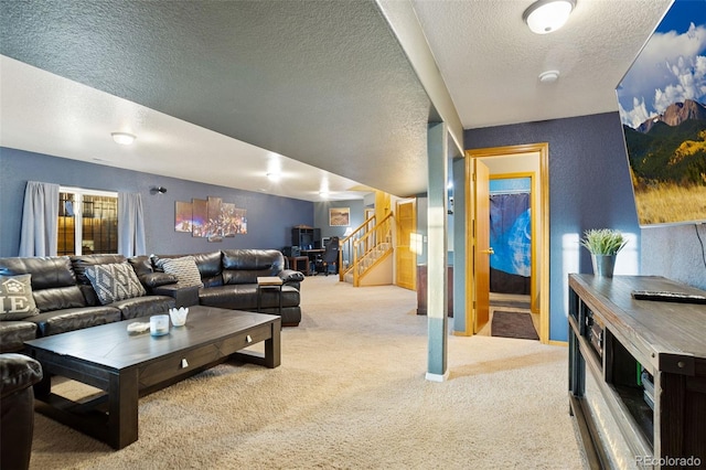 living room with light carpet and a textured ceiling