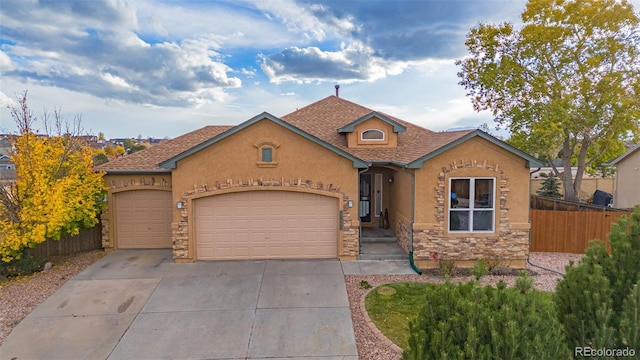 view of front of home with a garage