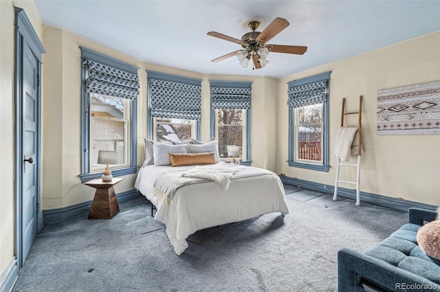 bedroom with light carpet and ceiling fan