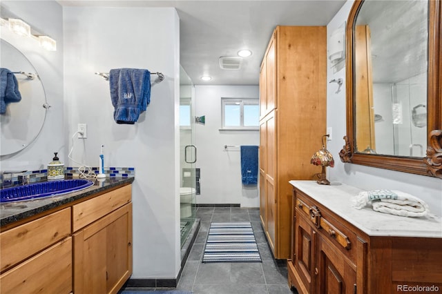 1069 Crestmoor Dr, Boulder, CO 80303 - full bath with tile patterned flooring, a stall shower, and vanity