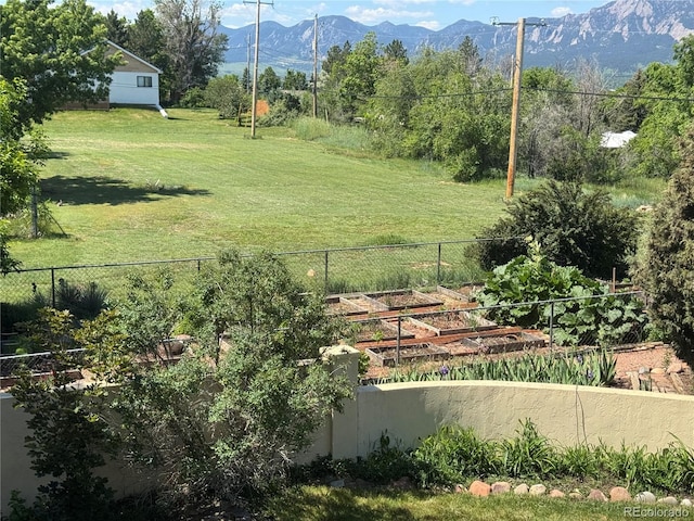 1069 Crestmoor Dr, Boulder, CO 80303 - view of yard with a vegetable garden and a mountain view