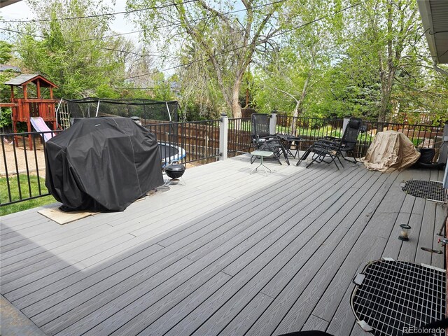 465 Salem St, Aurora, CO 80011 - deck featuring grilling area and a playground