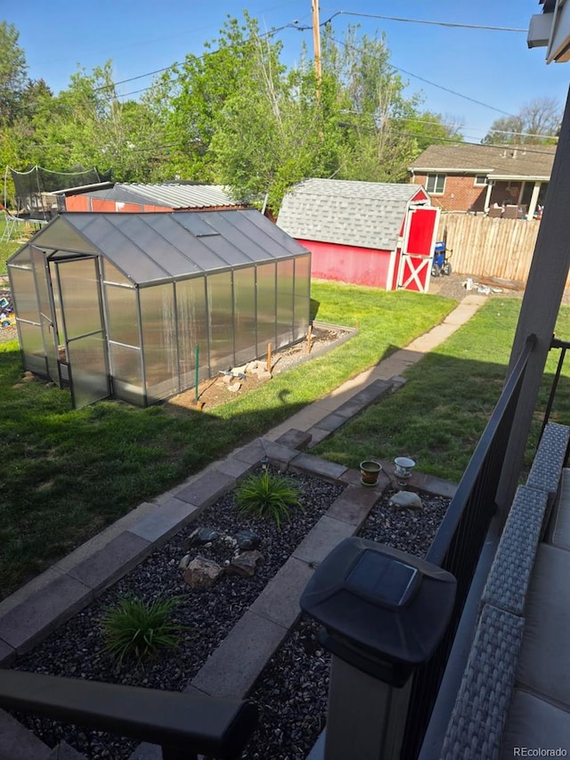 465 Salem St, Aurora, CO 80011 - view of yard with an exterior structure, an outdoor structure, and a storage shed