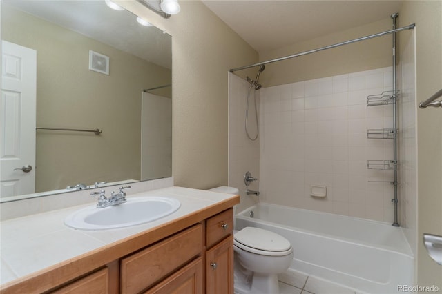 full bathroom with shower / bath combination, visible vents, toilet, vanity, and tile patterned flooring