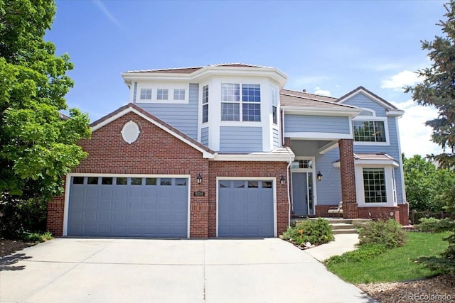6254 S Riviera Ct, Aurora, CO 80016 - traditional-style home with driveway, brick siding, an attached garage, and a garage