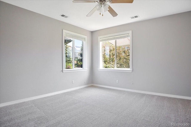 6254 S Riviera Ct, Aurora, CO 80016 - spare room featuring carpet floors, a ceiling fan, and baseboards