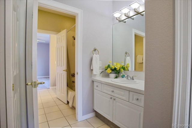 6254 S Riviera Ct, Aurora, CO 80016 - full bath with tile patterned flooring, vanity, and washtub / shower combination