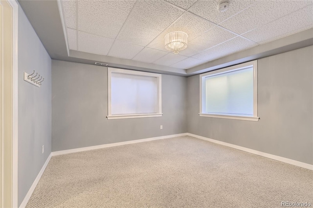 6254 S Riviera Ct, Aurora, CO 80016 - unfurnished room featuring carpet flooring, baseboards, a drop ceiling, and a smoke detector