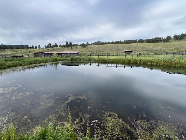 property view of water with a rural view