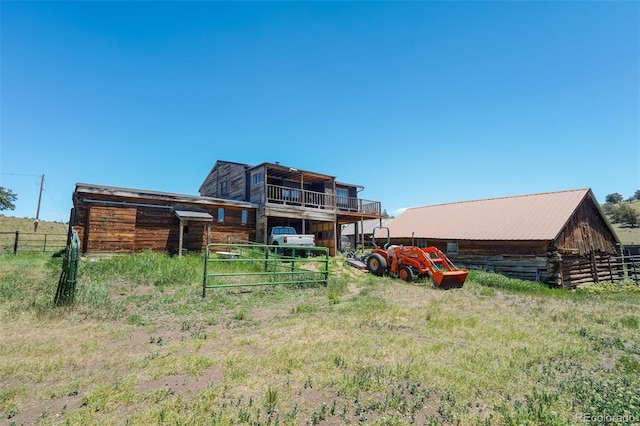 view of yard with an outbuilding and a deck