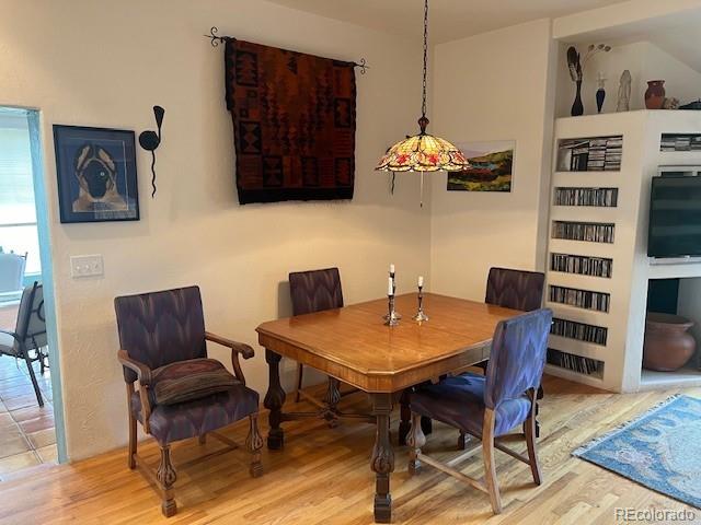 dining room featuring light hardwood / wood-style flooring