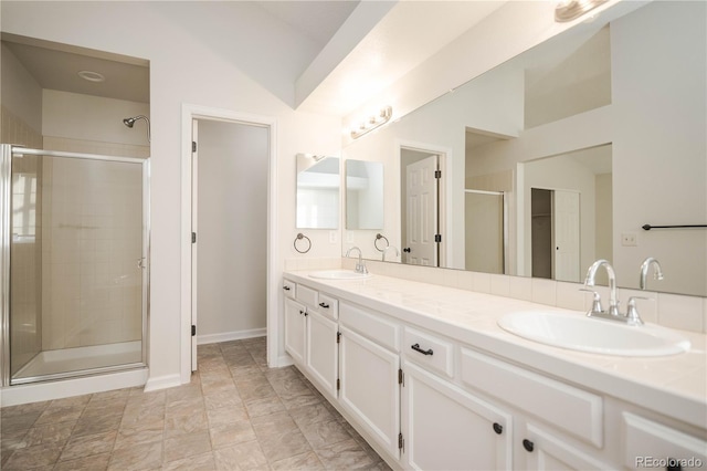 bathroom featuring vanity and walk in shower