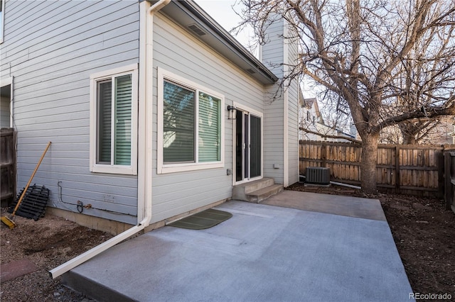 view of home's exterior featuring central AC and a patio area