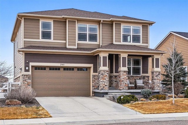 view of front of house featuring an attached garage, stone siding, driveway, a porch, and a shingled roof