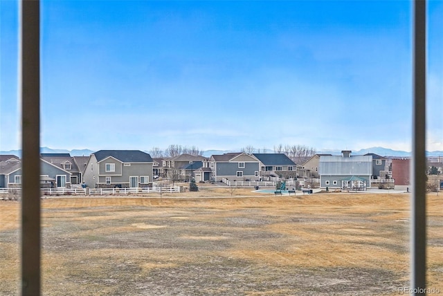 view of yard featuring a residential view