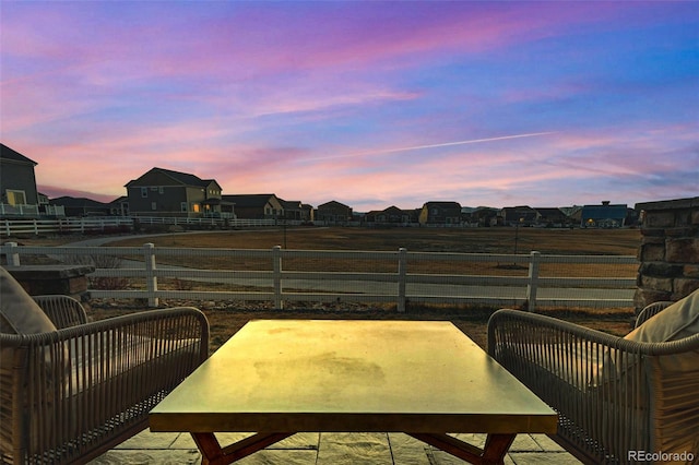 patio terrace at dusk with fence
