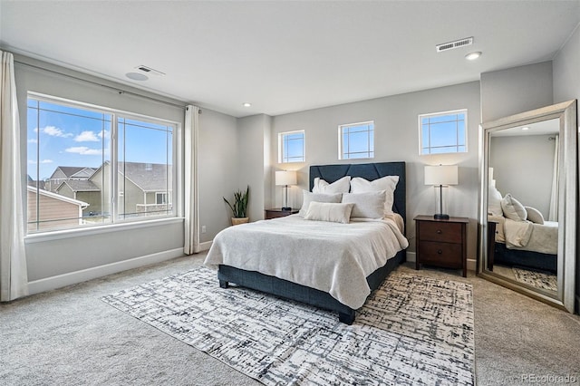 bedroom featuring baseboards, carpet flooring, visible vents, and recessed lighting