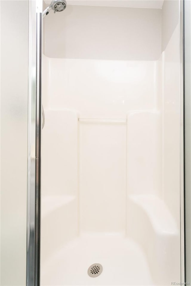 bathroom with a stall shower