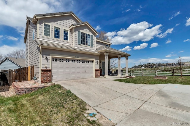 view of front of house with concrete driveway, an attached garage, brick siding, and fence