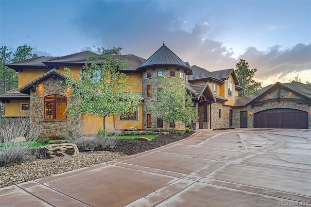 view of front of property with a garage