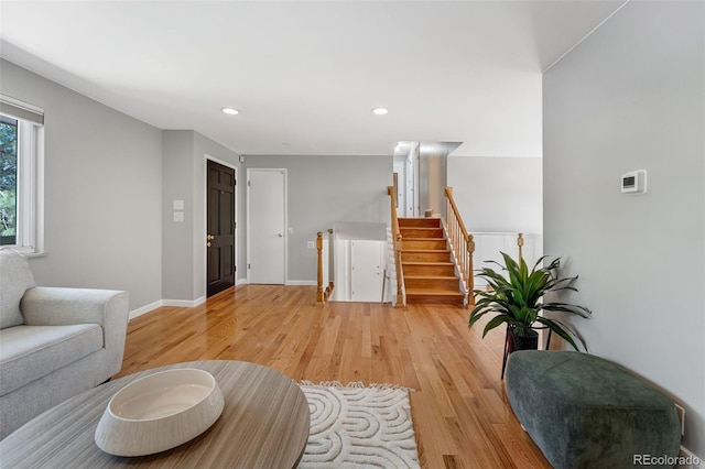 4660 E Briarwood Pl, Centennial, CO 80122 - living area with light wood-type flooring, recessed lighting, and stairs