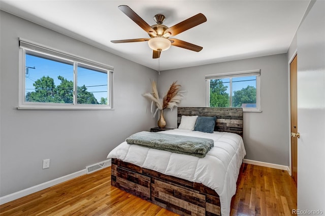 4660 E Briarwood Pl, Centennial, CO 80122 - bedroom featuring wood finished floors, ceiling fan, and a closet