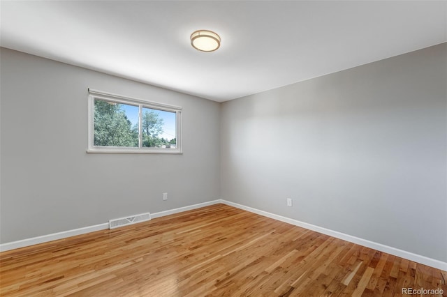 4660 E Briarwood Pl, Centennial, CO 80122 - unfurnished room featuring baseboards and light wood finished floors