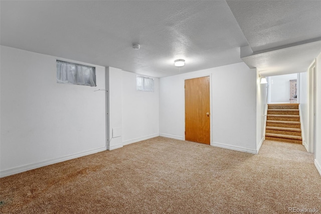 4660 E Briarwood Pl, Centennial, CO 80122 - finished basement featuring a textured ceiling, carpet, and stairway