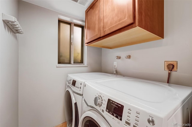 4660 E Briarwood Pl, Centennial, CO 80122 - laundry area featuring separate washer and dryer and cabinet space