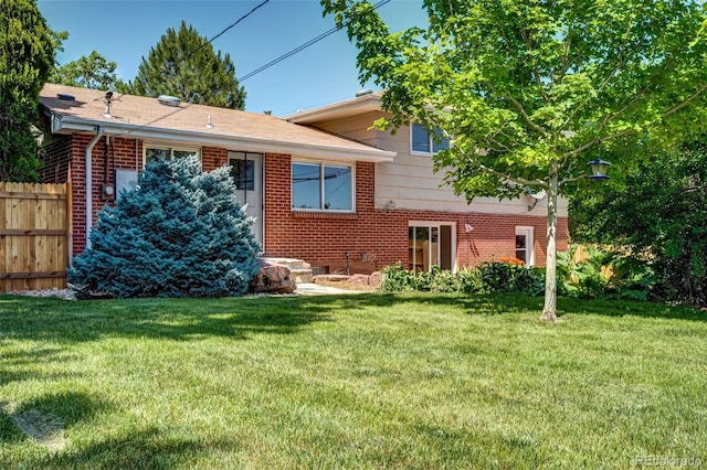 4660 E Briarwood Pl, Centennial, CO 80122 - rear view of house with brick siding