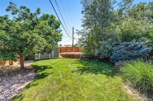 4660 E Briarwood Pl, Centennial, CO 80122 - fenced backyard featuring a storage shed