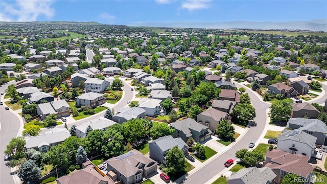 aerial view with a mountain view and a residential view