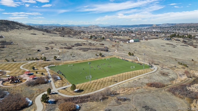 birds eye view of property with a rural view and a mountain view