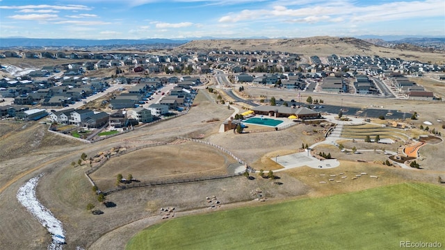 drone / aerial view with a mountain view and a residential view