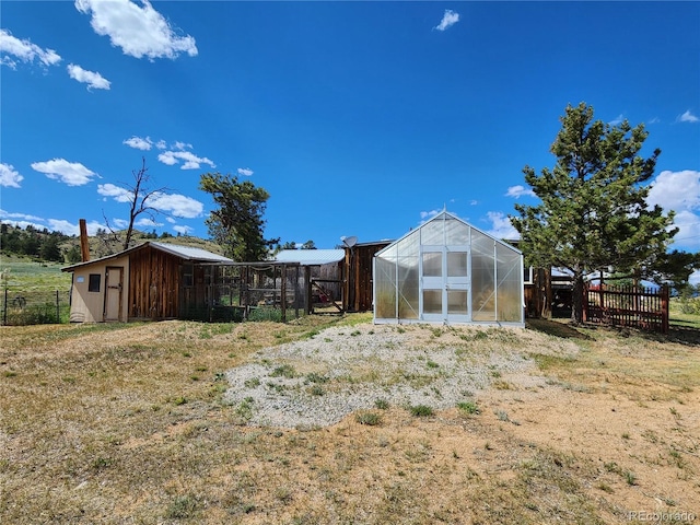 exterior space with an outbuilding